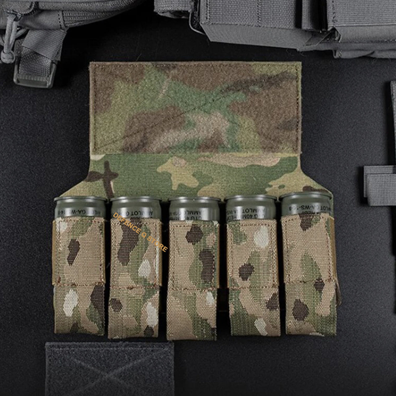 Transform your tactical vest or plate carrier into a versatile and efficient equipment with our 40MM Elite Tactical Vest Adaptor Panel in Multicam. Easily store up to 5 40mm grenades for quick and easy access in any mission or training. This must-have accessory is compatible with most tactical vests and plate carriers, making it the perfect addition to your gear. Elevate your performance and be prepared for any situation. www.moralepatches.com.au