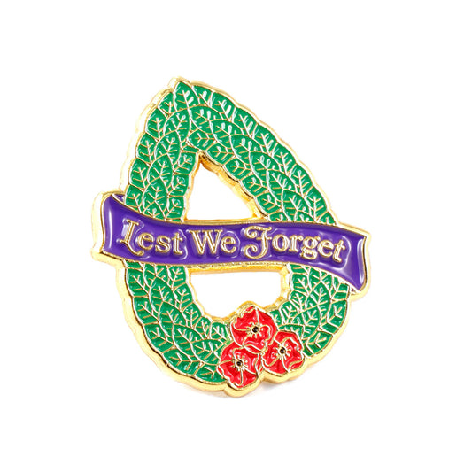 Shaped like a traditional teardrop wreath, this gold-plated lapel pin features the design of green laurel leaves. Also known as bay leaves, this foliage is often used in the creation of wreaths. www.moralepatches.com.au