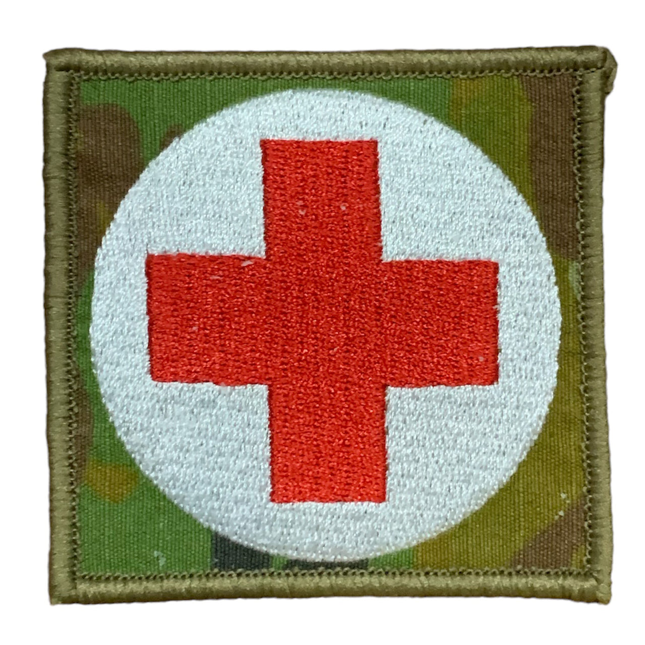 This Military Combat Patch, with the option of Plain or Velcro backing, is an essential for First Aid personnel in the field. Made from high-quality materials, this patch features an Australian-made field medical symbol and can easily be attached to First Aid Kits, Packs, or arm bands. Its exceptional quality is evident with overlocked edges and a size of 65mm x 65mm. Plus, it's proudly made in Australia using AMC Fabric. www.moralepatches.com.au