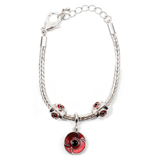 A piece to treasure. This vibrant charm bracelet is the perfect accessory for any outfit. Delicate and beautifully crafted, this sensational charm bracelet is a wonderful addition to any outfit or collection. With a full colour red poppy charm, this bracelet is a perfect gift for a loved one, or for you. www.moralepatches.com.au