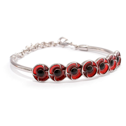 A beautiful charm bracelet to inspire remembrance. This delicate silver-plated 7 Charm Poppy Bracelet is a wonderful way to remember and honour the men and women who serve our country, both today and throughout our history. www.moralepatches.com.au