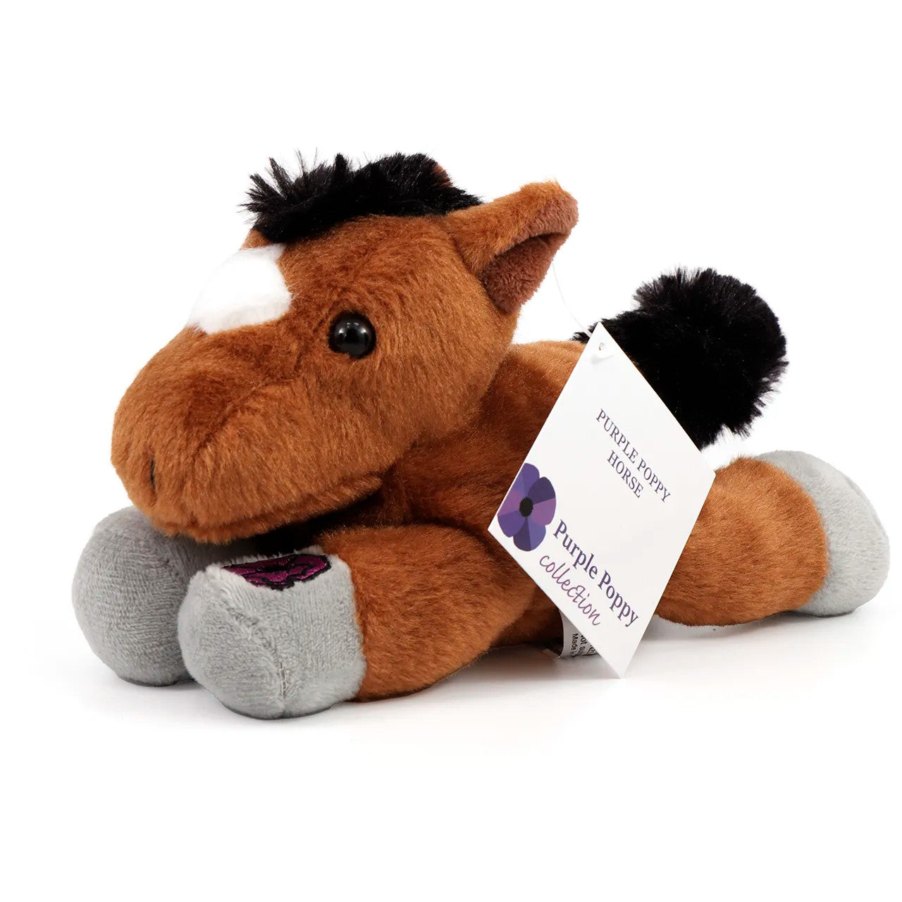 The Purple Poppy Horse is a floppy toy that allows you to show your support for the recognition of war animals and their unwavering service alongside humans throughout history. The purple poppy is a unique symbol that pays tribute to these brave animals and their invaluable contributions. www.moralepatches.com.au