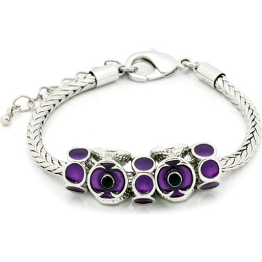 The Purple Poppy Charm Bracelet is a stunning piece of jewellery that pays tribute to the service and sacrifice of animals in war. The bracelet features vivid purple poppies, symbolizing the un-sung heroes of the animal kingdom. With its beautiful silver plate design, this bracelet is a must-have for animal lovers and those who appreciate the bravery of our service animals. www.moralepatches.com.au