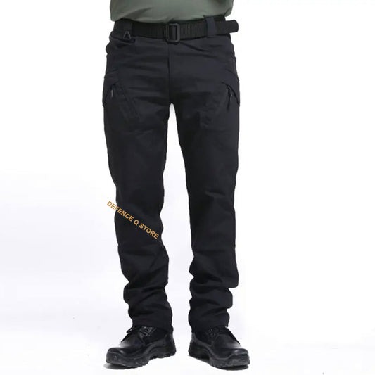 Stay comfortable and prepared during any outdoor activity or work with our Tactical Lightweight Outdoor Trousers Black. Featuring a zipper closure and an elastic waist for a secure fit, these trousers also have 8 convenient pockets- 2 front hand pockets, 2 back hand pockets, 2 zipper pockets, and 2 cargo pockets with hook and loop closures, perfect for carrying essentials like a knife and phone. www.moralepatches.com.au