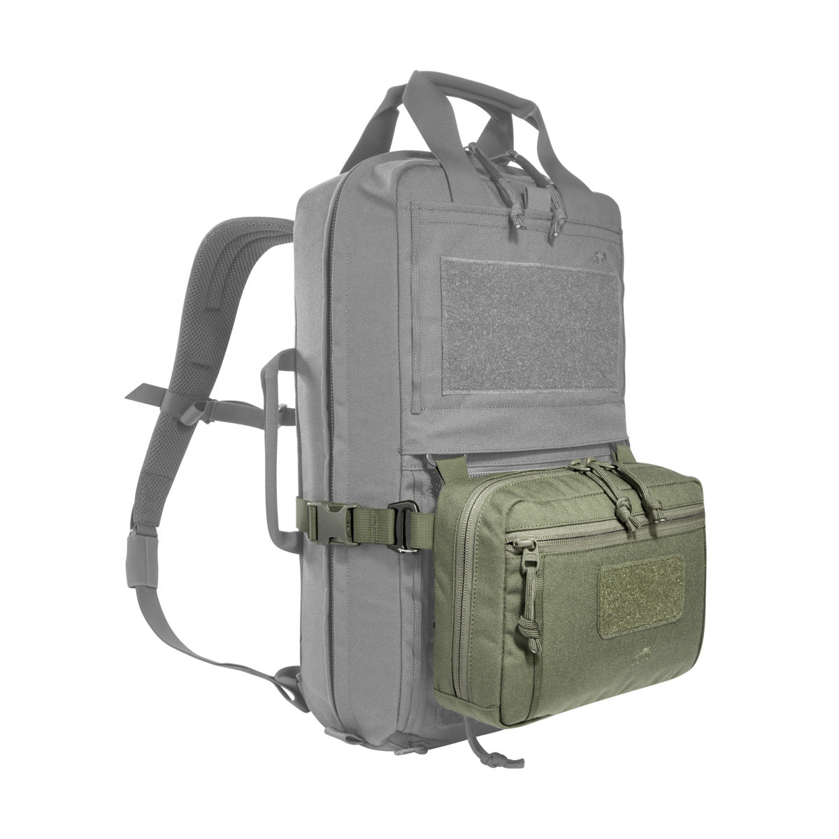 The bag has a removable MOLLE reverse system for attachment to plate carriers and backpacks. In addition, it can be hooked with loops to the TT Survival Pack or other MOLLE surfaces with appropriate buckles. There is also a pass-through for a 50mm belt loop. Inside are flat mesh pockets, elastic loops and a large MOLLE hook-and-loop surface. www.moralepatches.com.au