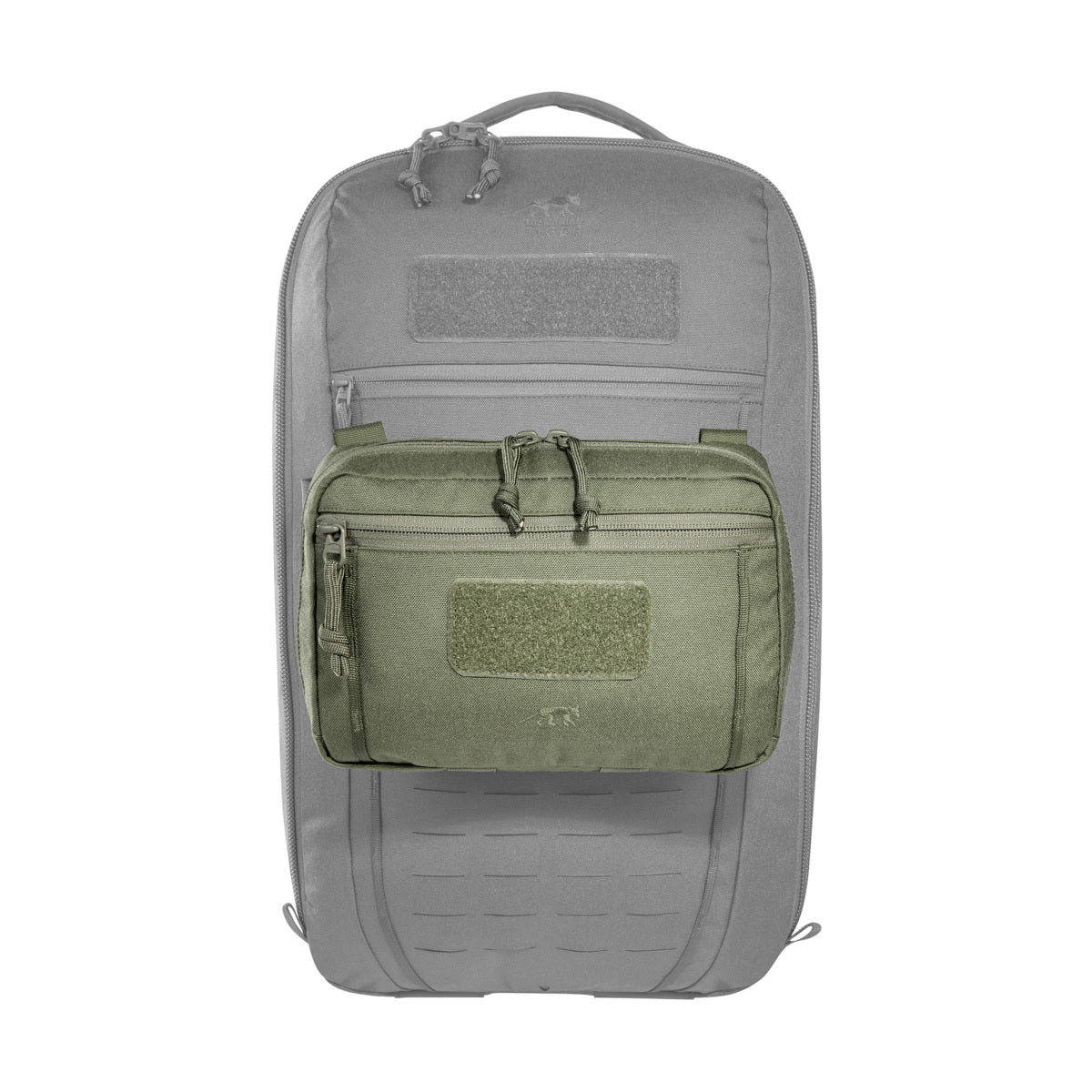 The bag has a removable MOLLE reverse system for attachment to plate carriers and backpacks. In addition, it can be hooked with loops to the TT Survival Pack or other MOLLE surfaces with appropriate buckles. There is also a pass-through for a 50mm belt loop. Inside are flat mesh pockets, elastic loops and a large MOLLE hook-and-loop surface. www.moralepatches.com.au