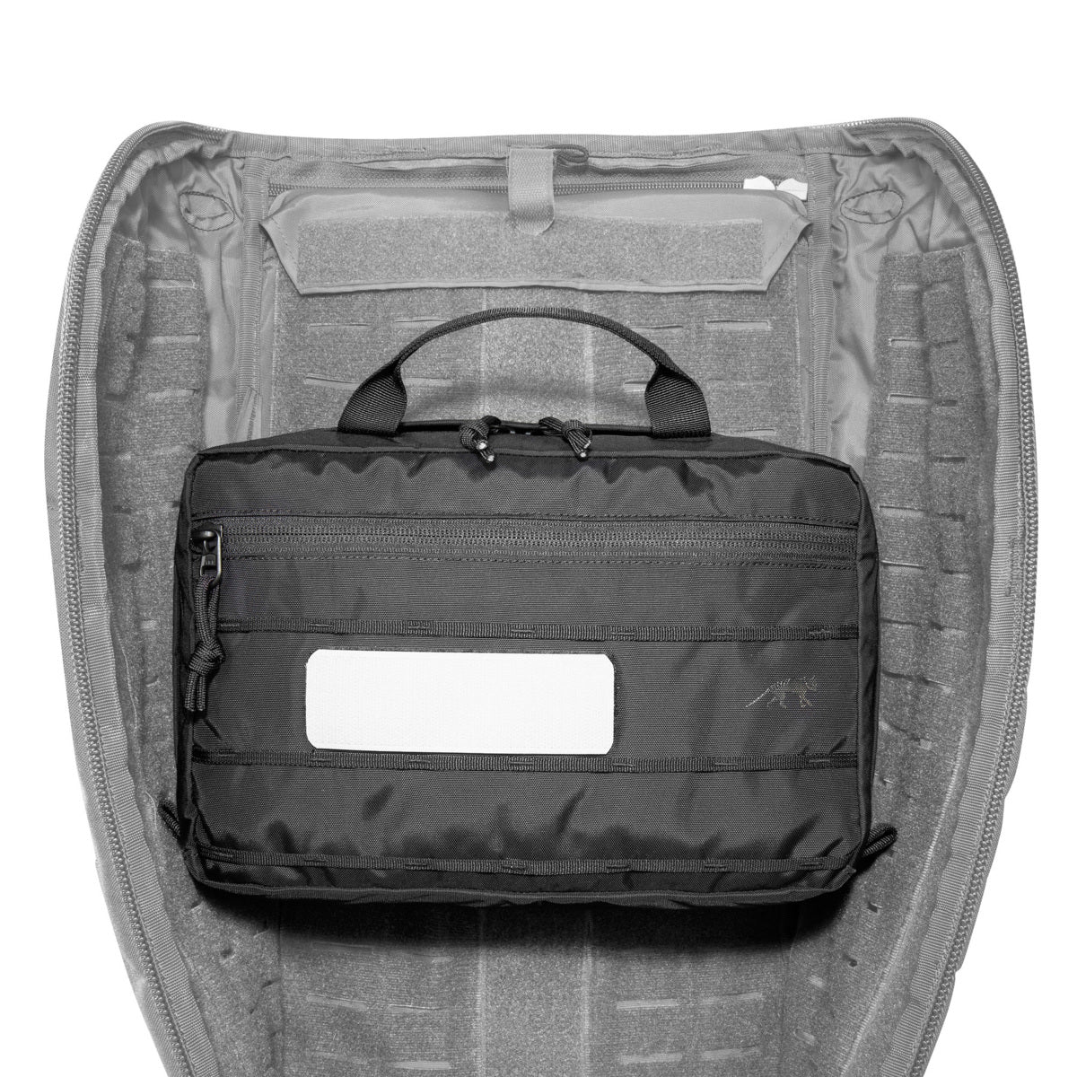 The TT Multipurpose Pouch VL can be attached to modular backpacks using the large, coverable hook-and-loop areas on the outside. On the inside it features mesh pockets, loops and an organizer. www.moralepatches.com.au