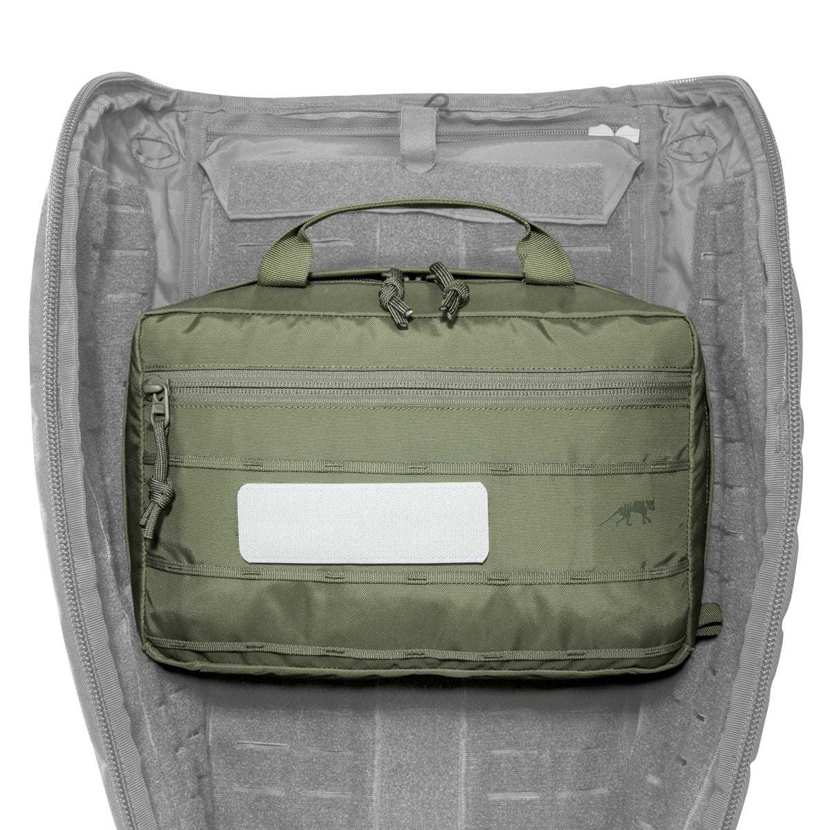 Sturdy equipment bag with 6 liter volume and handle. Attachable to modular backpacks. With mesh pockets, loops and an organizer inside. www.moralepatches.com.au