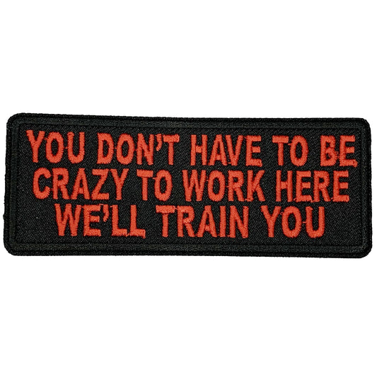 You don't have to be crazy to work here, we'll train you Iron On Patch. Great for attaching to your jackets, shirts, pants, jeans, hats.  Size: 10.4X4cm www.moralepatches.com.au