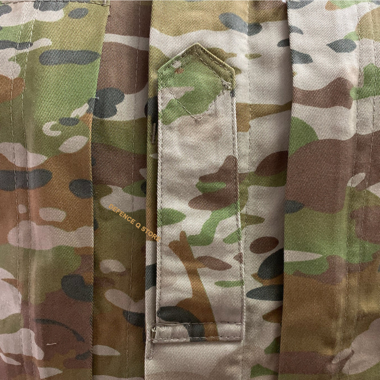 Be ready for any mission with our Army Tactical Field Shirt AMC! Made from 100% cotton, it's durable and comfortable for all day wear. With a single epaulette on the chest and buttoned shoulder pockets, you'll have easy access to necessary items. Plus, the zippered chest pockets add extra storage space. Customize your look by adding velcro patches to both arms. This shirt is a must-have for any tactical enthusiast. www.moralepatches.com.au