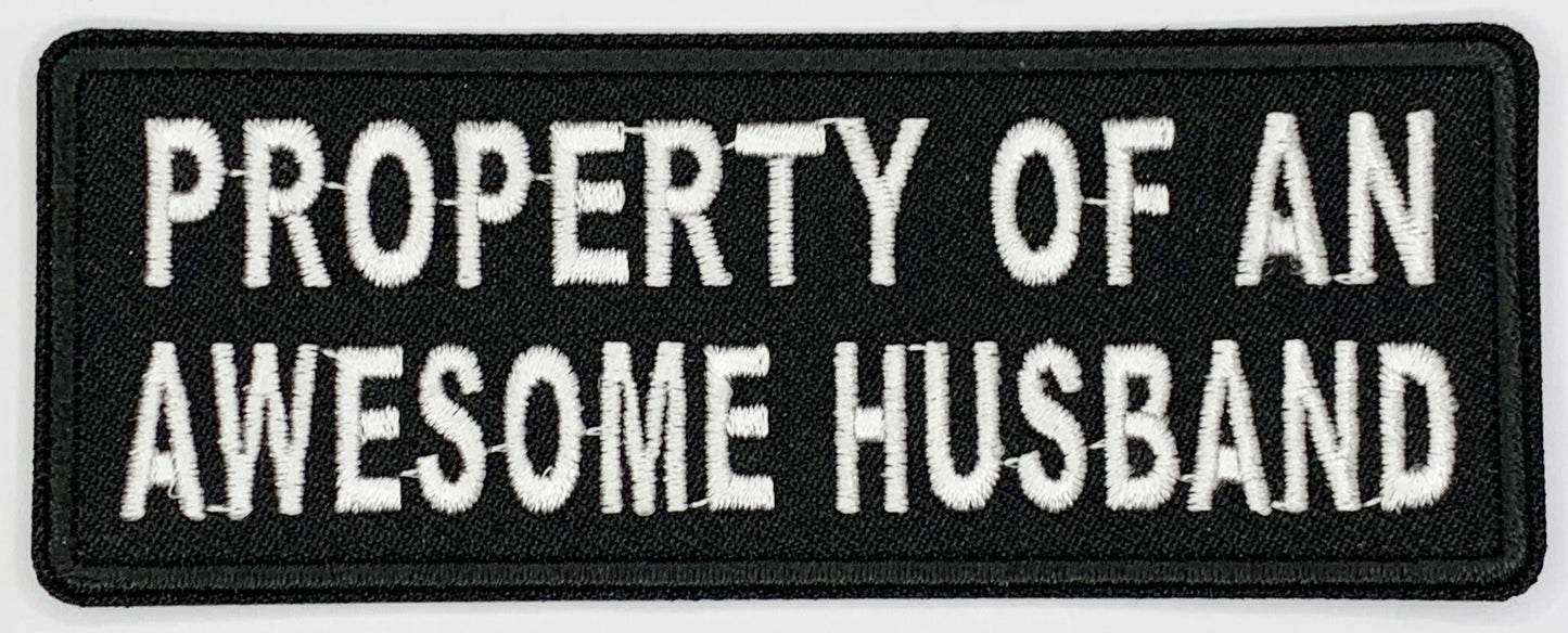 Property of an awesome husband Iron On Patch. Great for attaching to your jackets, shirts, pants, jeans, hats.  Size: 10.3X4cm