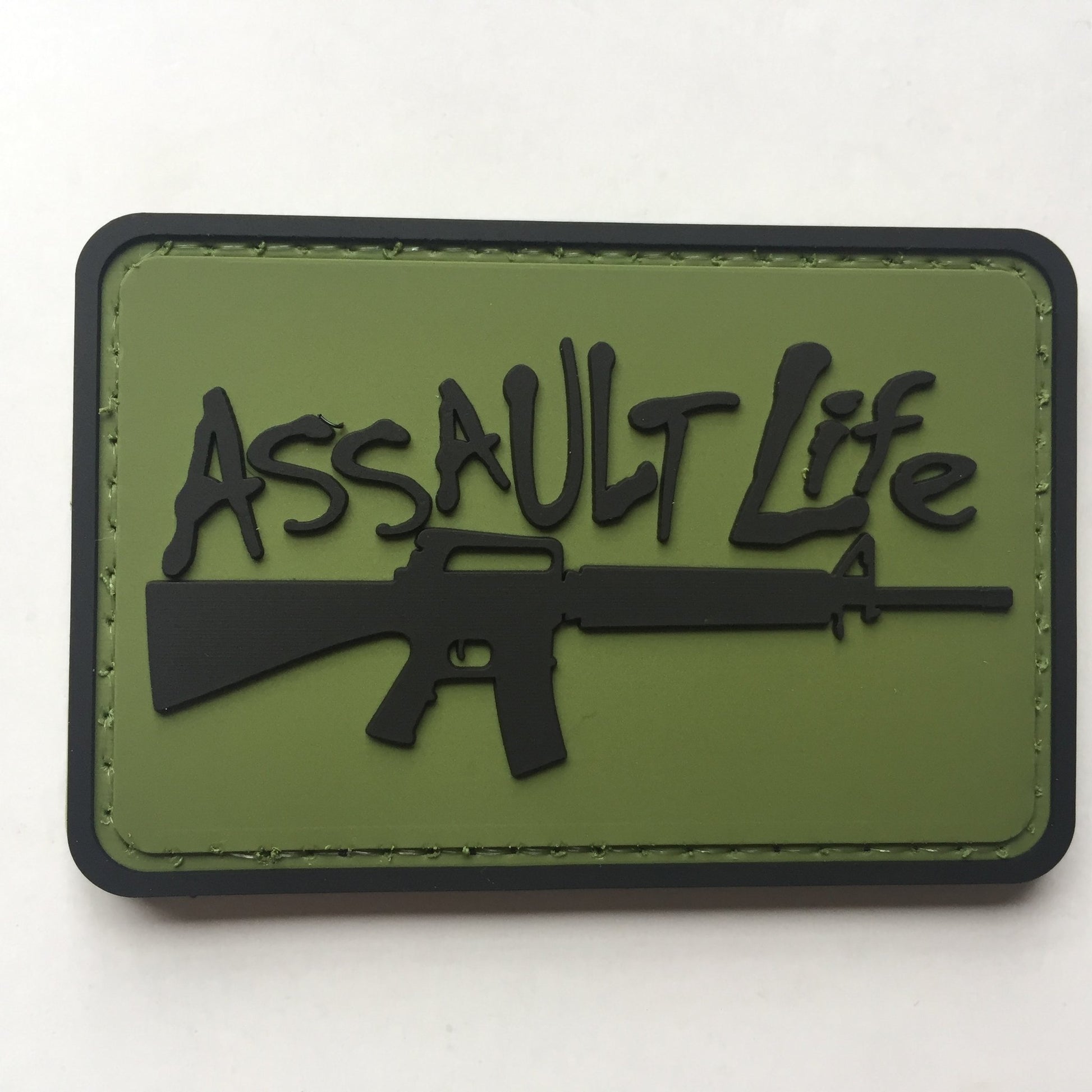 Assault Life PVC Patch, Velcro backed Badge. Great for attaching to your field gear, jackets, shirts, pants, jeans, hats or even create your own patch board.  Size: 7.5x5cm