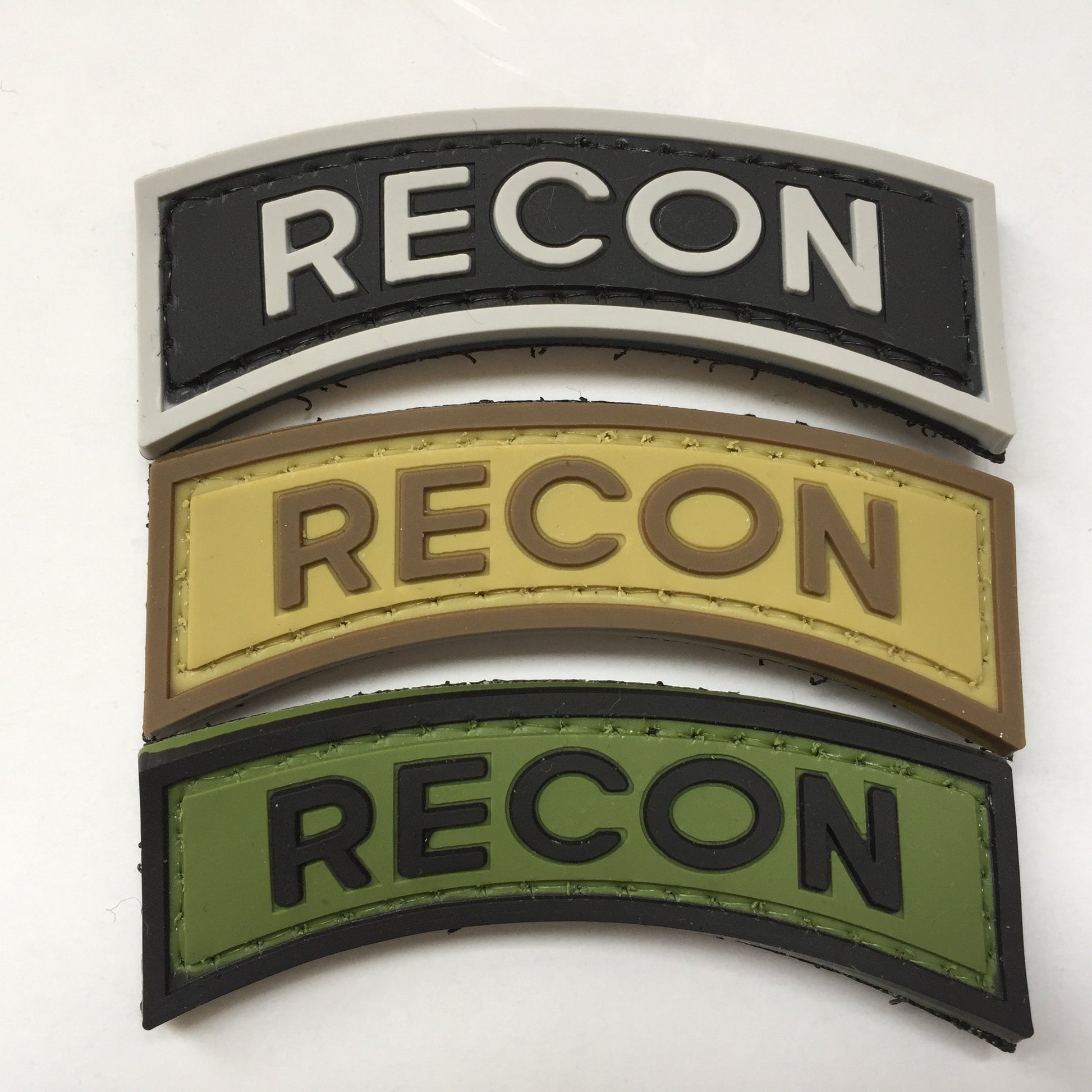 RECON PVC Patch, Velcro backed Badge. Great for attaching to your field gear, jackets, shirts, pants, jeans, hats or even create your own patch board.  Size: 6.2x2cm