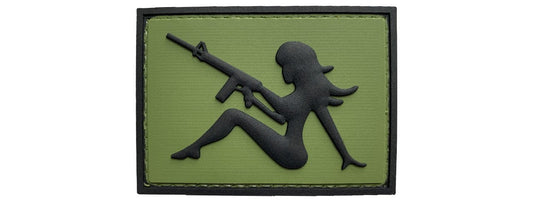 Mudflap Girl with Rifle on Right Hand PVC Patch, Velcro backed Badge. Great for attaching to your field gear, jackets, shirts, pants, jeans, hats or even create your own patch board.  Size: 7x5cm