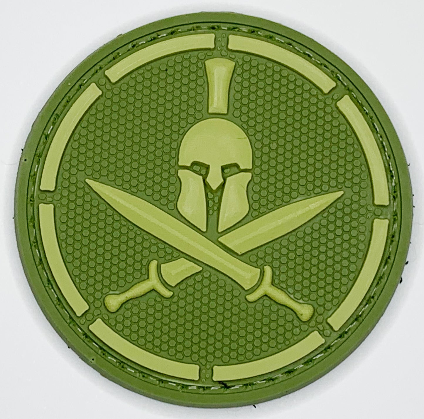 Spartan Helmet Crossed Swords PVC Patch, Velcro backed Badge. Great for attaching to your field gear, jackets, shirts, pants, jeans, hats or even create your own patch board.  Size: 6cm