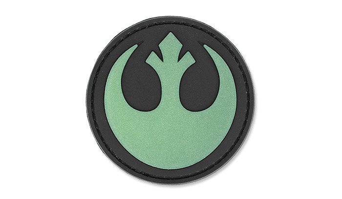 Rebel PVC Patch Glow in the Dark, Velcro backed Badge. Great for attaching to your field gear, jackets, shirts, pants, jeans, hats or even create your own patch board.  Size: 6cm