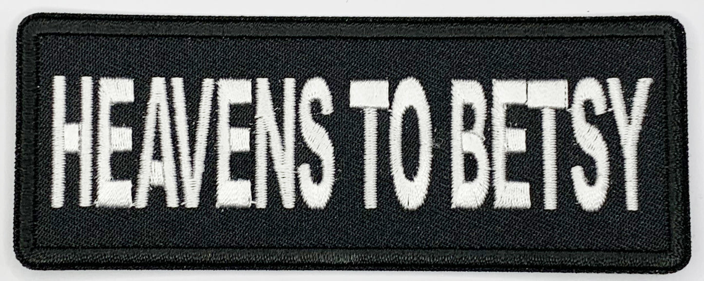 Heavens to Betsy Iron On Patch. Great for attaching to your jackets, shirts, pants, jeans, hats.  Size: 10.2x3.9cm