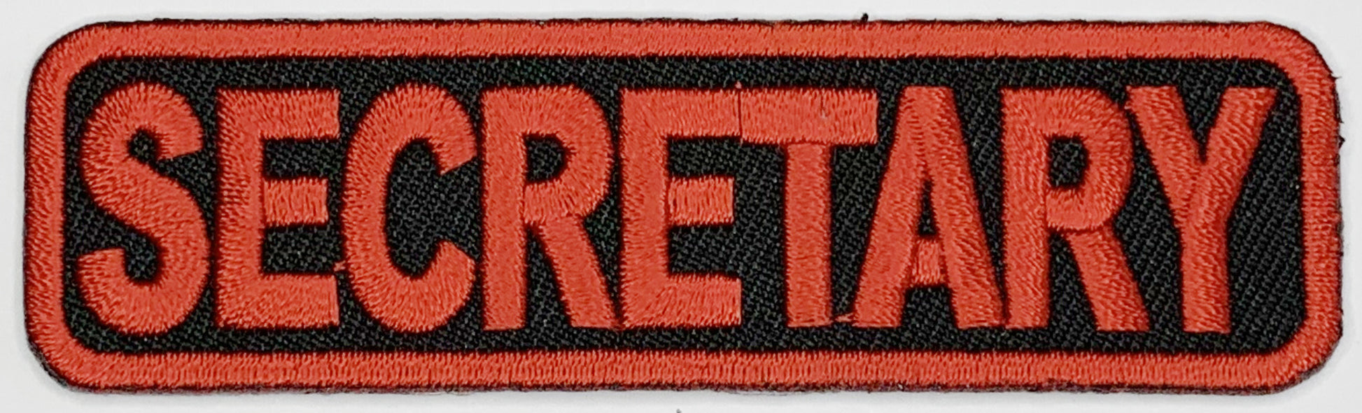 Secretary Iron On Patch. Great for attaching to your jackets, shirts, pants, jeans, hats.  Size: 8.89x2.54cm