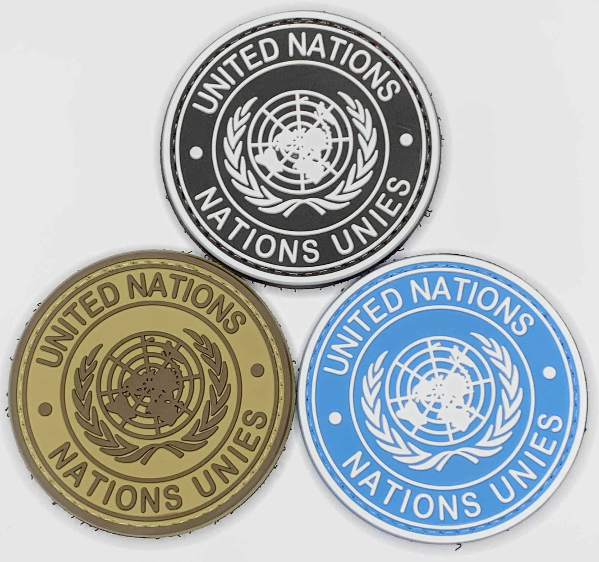 6cm PVC United Nations Flag Patch Round Tactical Velcro backed armband army combat badge in multiple colours.  Great for attaching to your field gear, jackets, shirts, pants, jeans, hats or even create your own patch board.