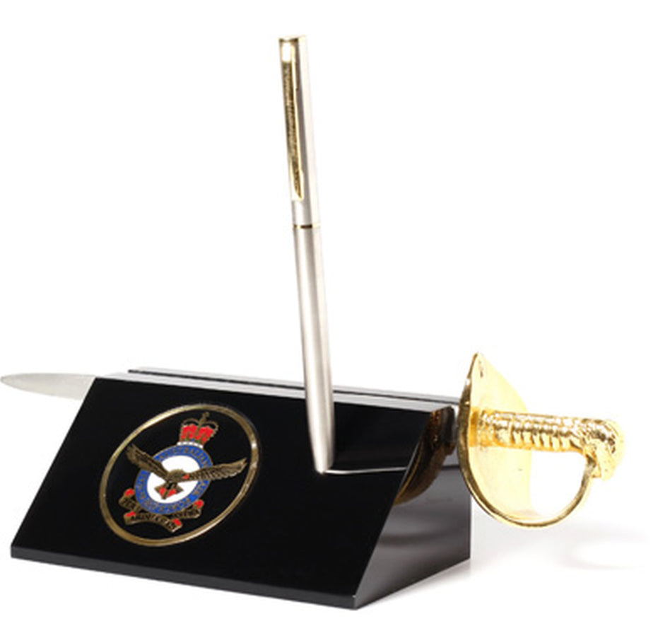 Air Force Medallion in a stylish acrylic desk stand with a quality pen and Air Force sword letter opener. Presented in a silver gift box with a clear lid, this is the perfect gift to put on the desk at work or at home.