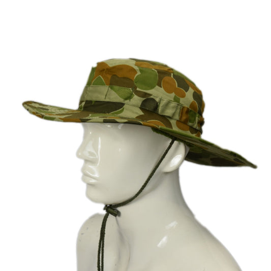 Army style 83 mm wide Brim Boonie Hat.  Slouch hat styled crown with cord chinstrap and cord lock.  Has towelling on the inside to wipe face with.  Colour: AUSCAM  Material: 100% Cotton  Sizes: 56-S 58-M 60-L 62-XL 64-2XL