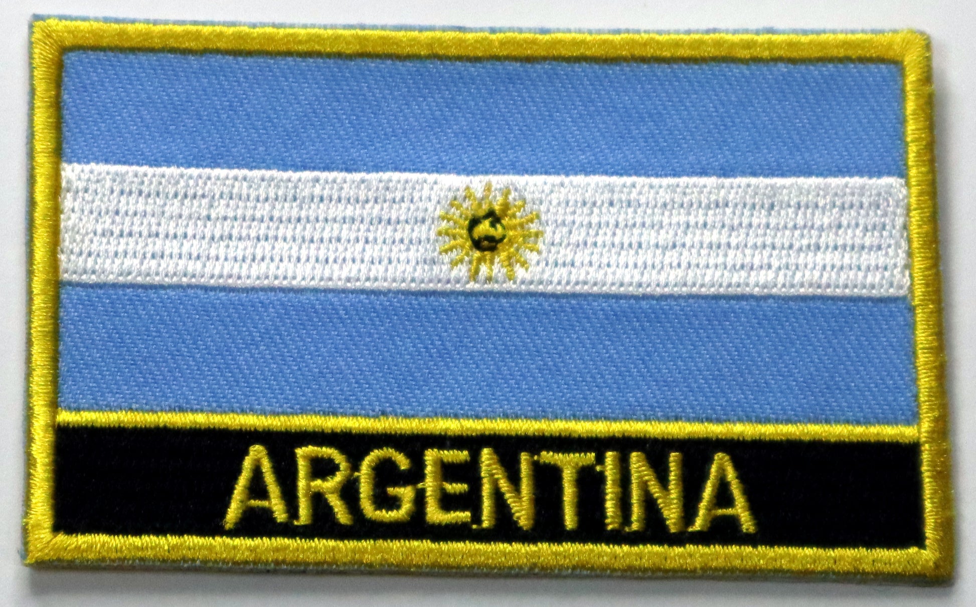 Argentina Flag Iron On Patch. Great for attaching to your jackets, shirts, pants, jeans, hats.  Size: 8x5cm