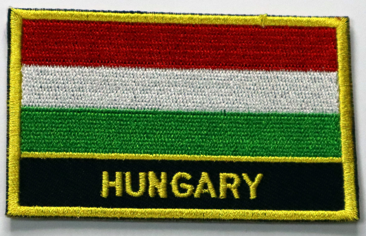 Hungary Flag Iron On Patch. Great for attaching to your jackets, shirts, pants, jeans, hats.  Size: 8x5cm