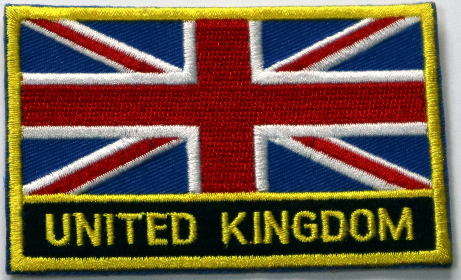 United Kingdom Flag Iron On Patch. Great for attaching to your jackets, shirts, pants, jeans, hats.  Size: 8x5cm