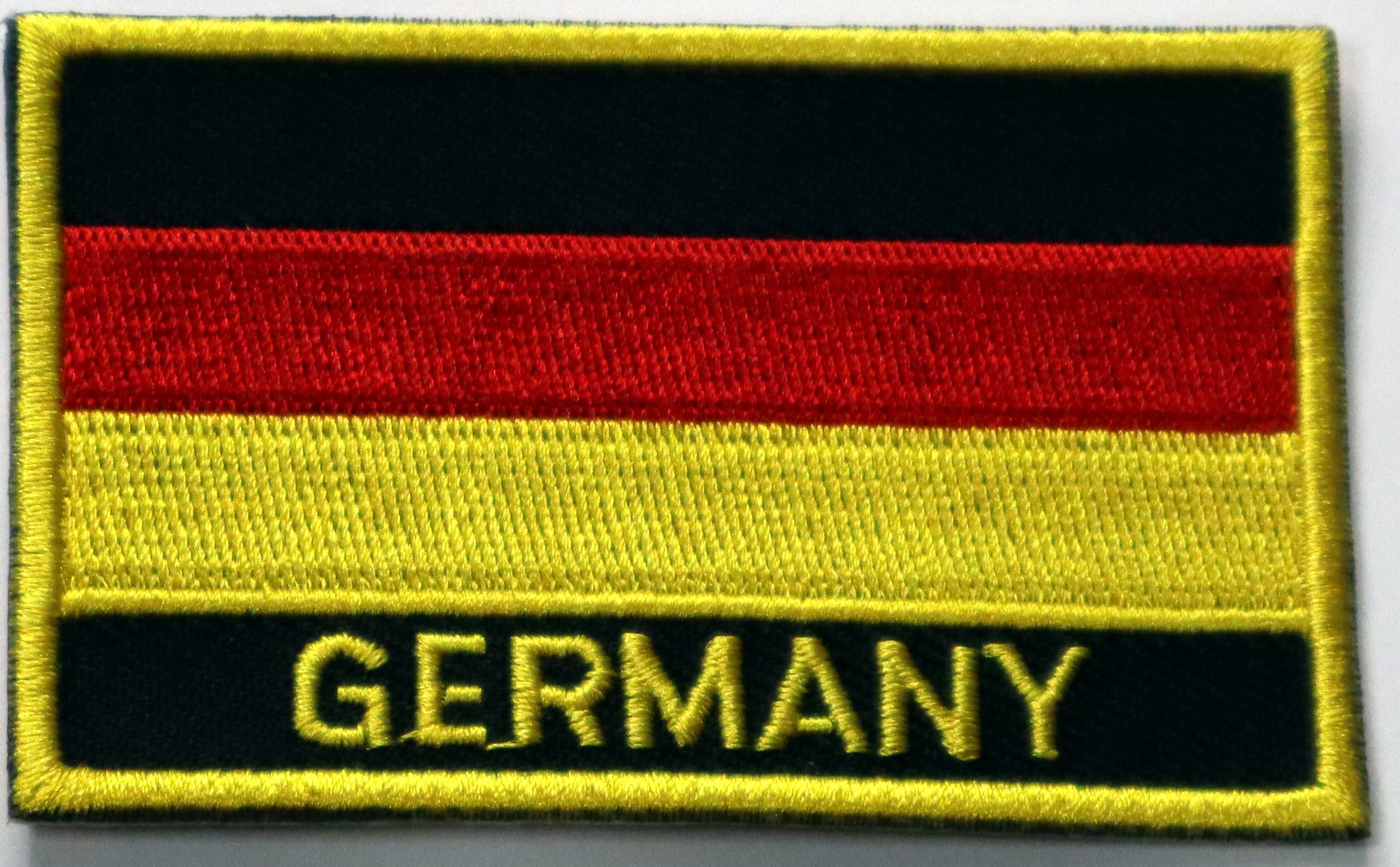 Germany Flag Iron On Patch. Great for attaching to your jackets, shirts, pants, jeans, hats.  Size: 8x5cm