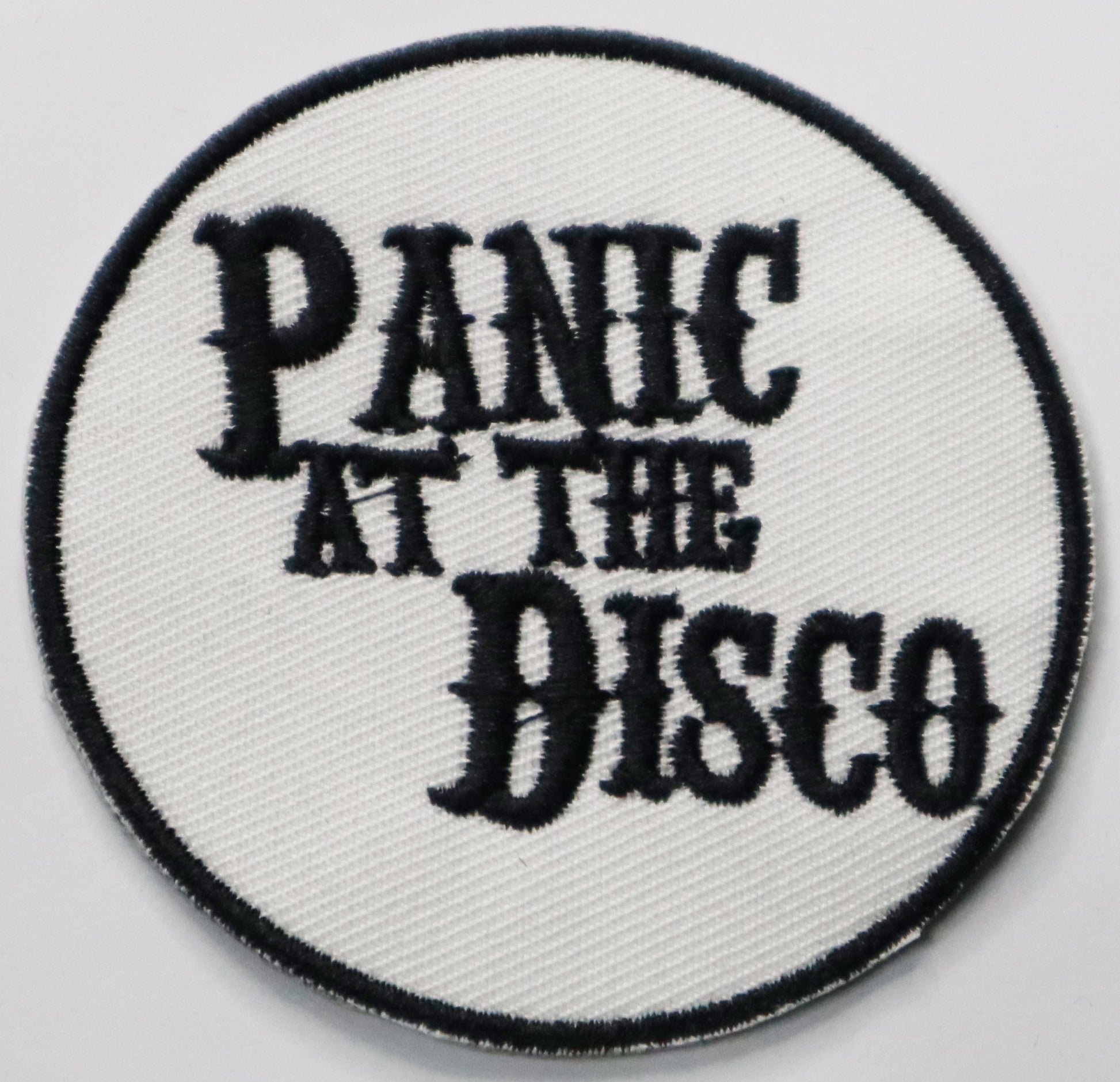 Panic at the disco Iron On Patch. Great for attaching to your jackets, shirts, pants, jeans, hats.  Size: 7cm