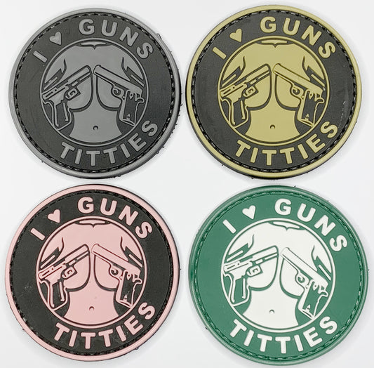 I Love Guns and Titties PVC Patch, Velcro backed Badge. Great for attaching to your field gear, jackets, shirts, pants, jeans, hats or even create your own patch board.  Size: 6cm