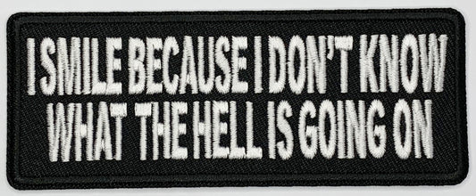 I smile because I don't know what the hell is going on Iron On Patch. Great for attaching to your jackets, shirts, pants, jeans, hats.  Size: 10.3x4cm