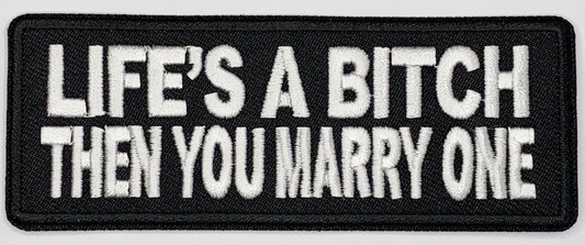 Life's a bitch then you marry one Iron On Patch. Great for attaching to your jackets, shirts, pants, jeans, hats.  Size: 10.4X4cm