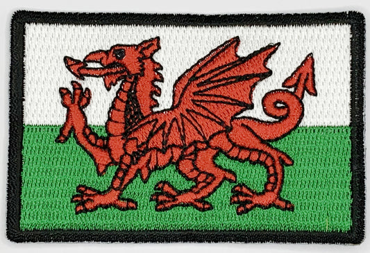 Wales Flag Iron On Patch. Great for attaching to your jackets, shirts, pants, jeans, hats.  Size: 7.62x5.08cm